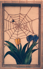 Spider web and tulips